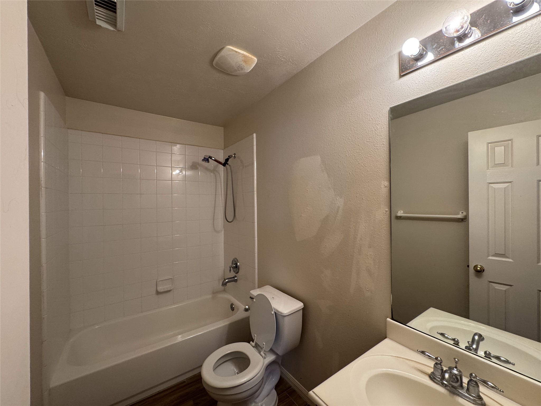 13723 Audra Lane Houston, TX 77083 - Photo 18 of 18 a bathroom with a sink a toilet and a bathtub