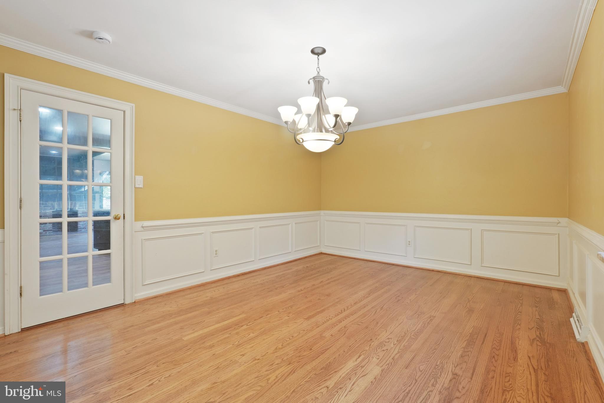 10 Rooftree Road Cherry Hill, NJ 08003 - Photo 20 of 58 a view of a room with wooden floor and chandelier