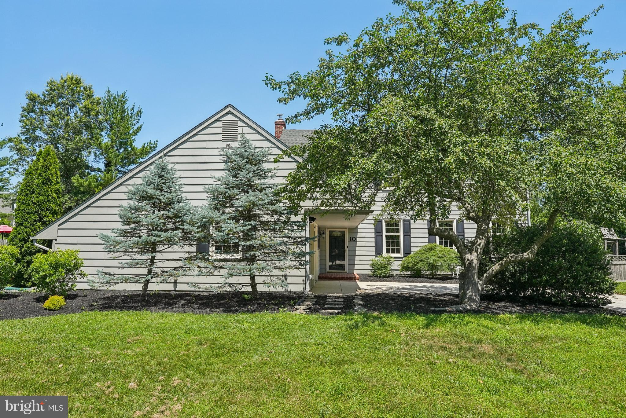 10 Rooftree Road Cherry Hill, NJ 08003 - Photo 2 of 58 a front view of a house with a yard