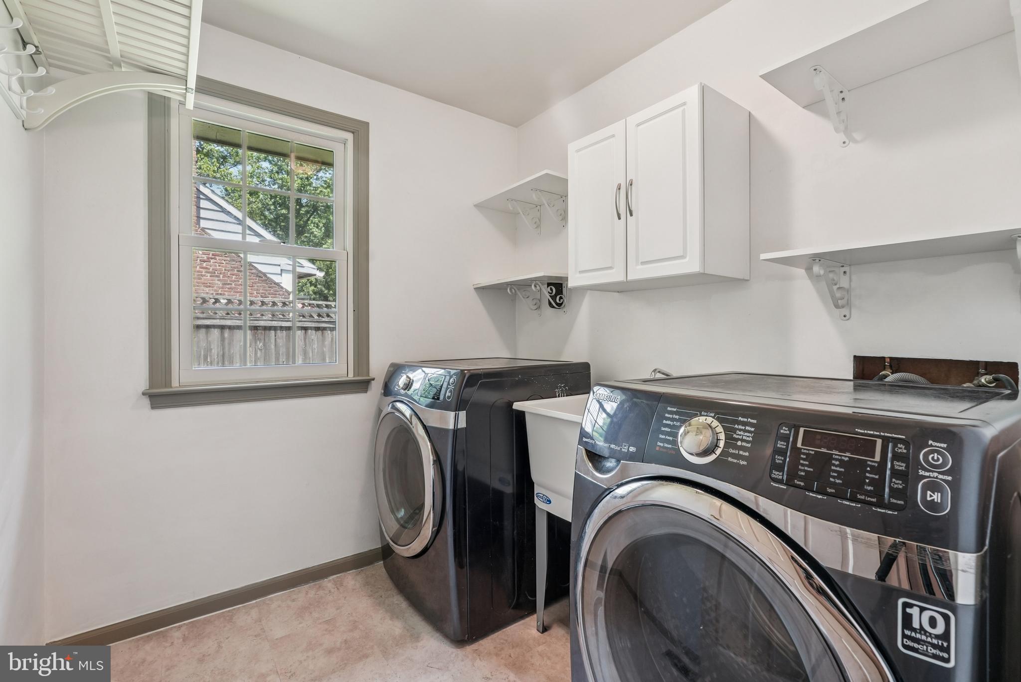 10 Rooftree Road Cherry Hill, NJ 08003 - Photo 23 of 58 a view of livingroom with washer and dryer