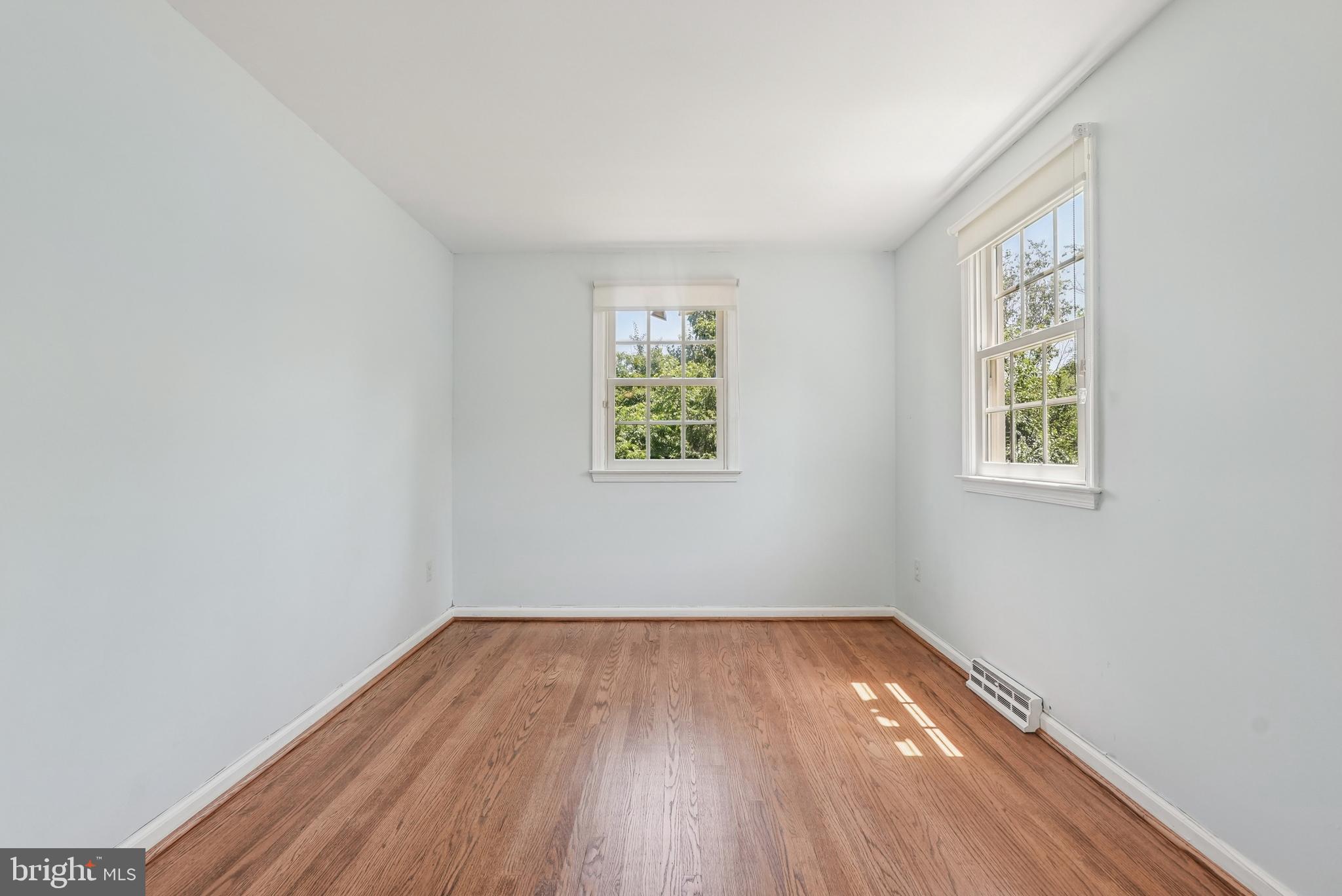10 Rooftree Road Cherry Hill, NJ 08003 - Photo 33 of 58 an empty room with wooden floor and windows