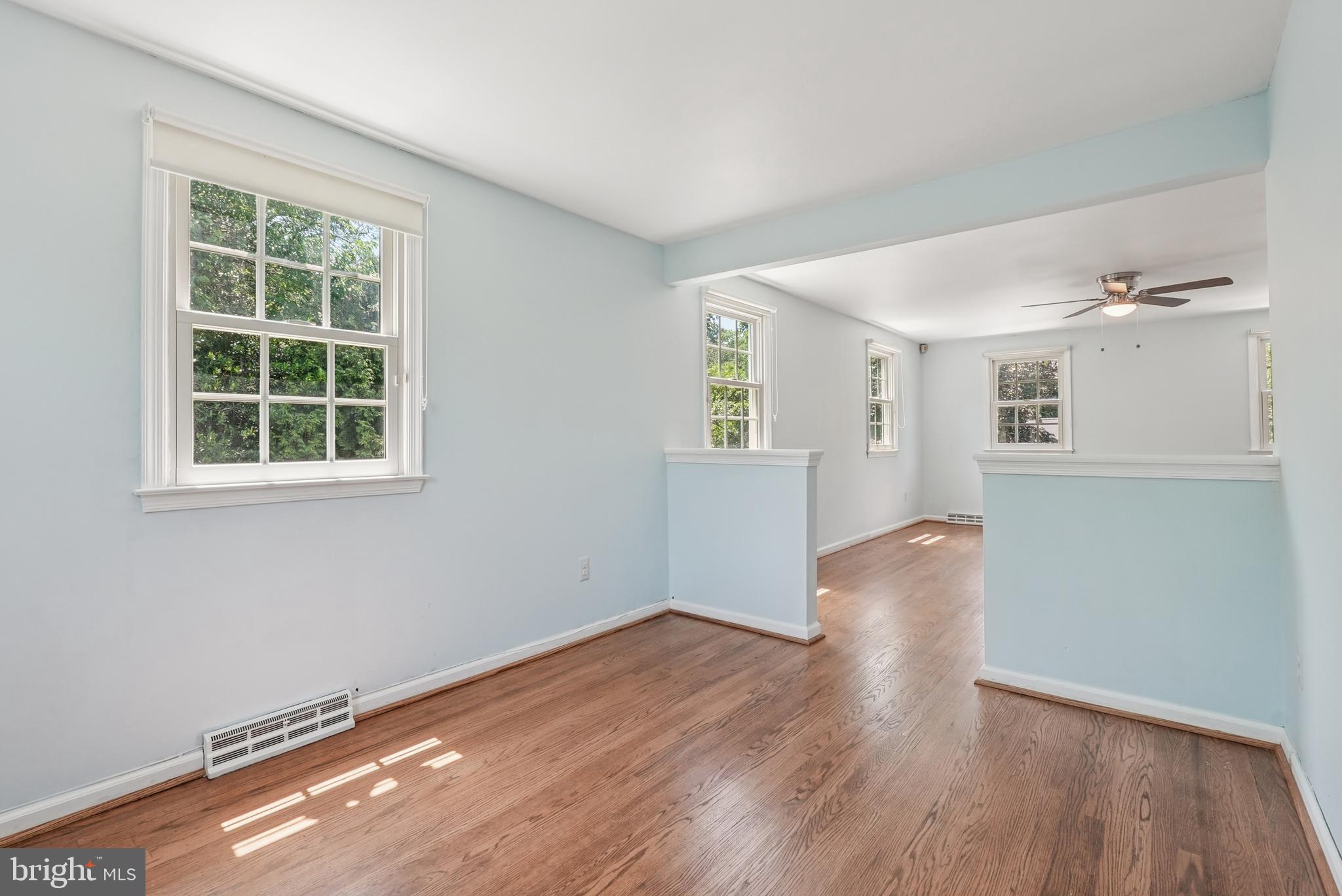 10 Rooftree Road Cherry Hill, NJ 08003 - Photo 35 of 58 an empty room with wooden floor and windows