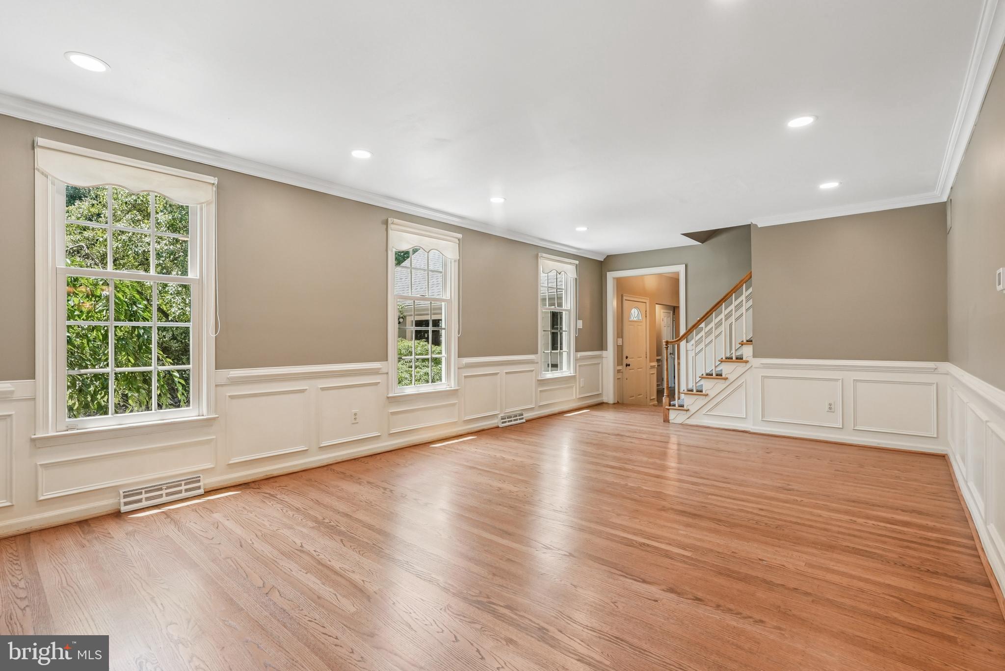 10 Rooftree Road Cherry Hill, NJ 08003 - Photo 4 of 58 a view of an empty room with wooden floor and a window