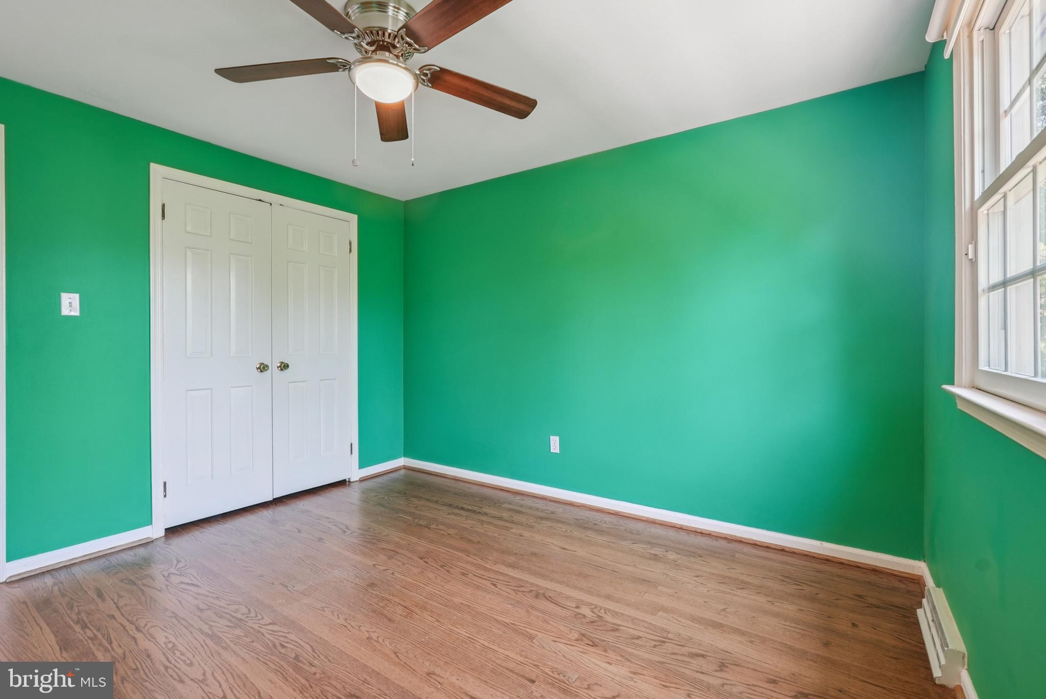 10 Rooftree Road Cherry Hill, NJ 08003 - Photo 41 of 58 wooden floor in an empty room with a window