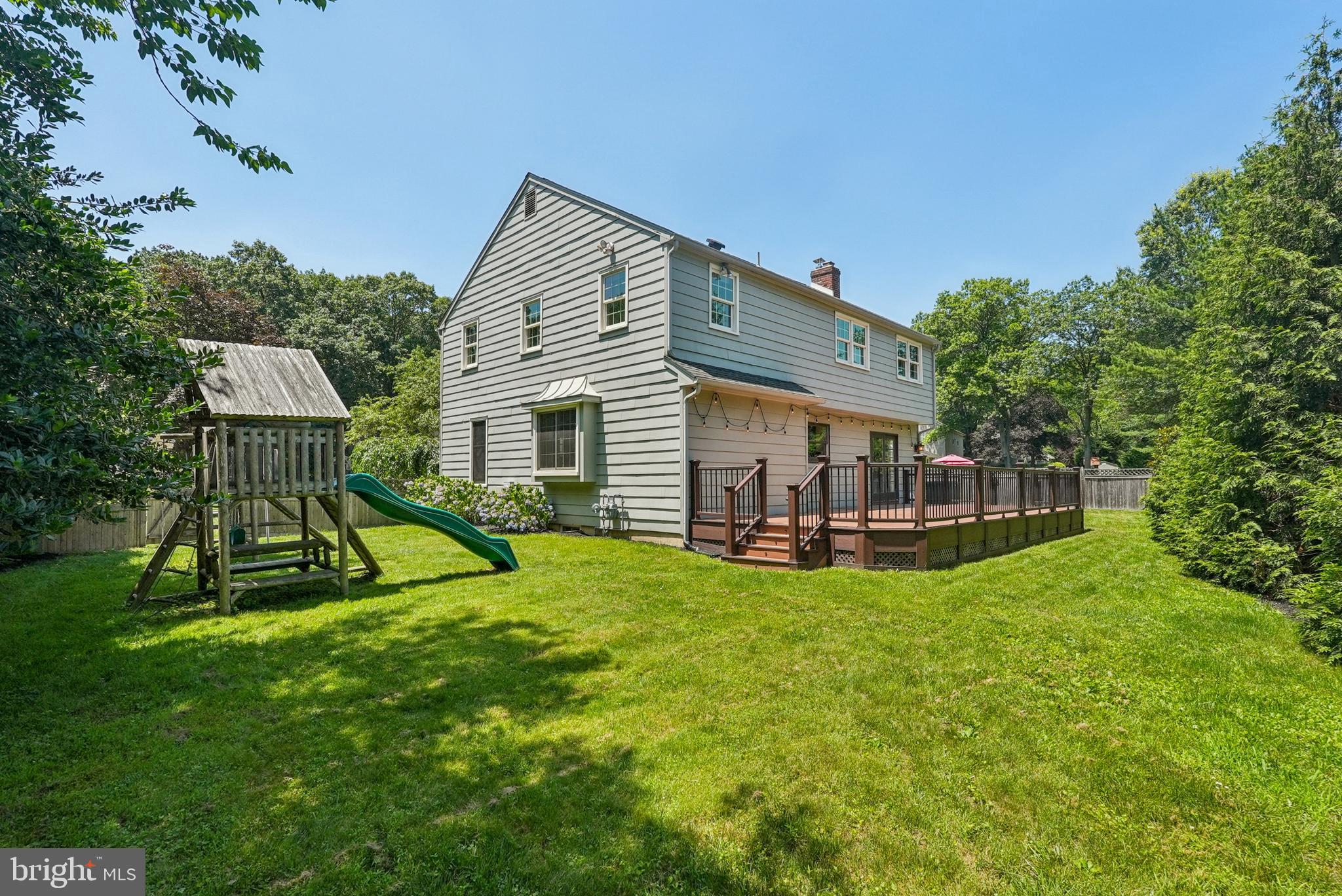 10 Rooftree Road Cherry Hill, NJ 08003 - Photo 57 of 58 a view of a house with a backyard and swimming pool