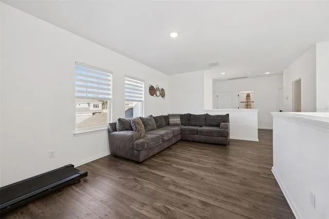 a view of swimming pool with outdoor seating