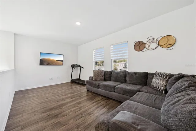 a view of a swimming pool with a yard