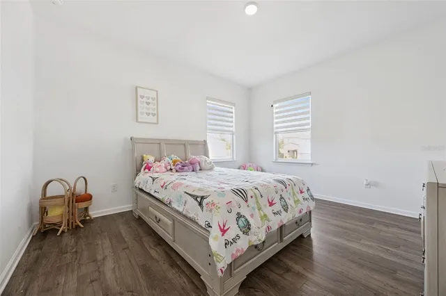 an aerial view of a house with outdoor space