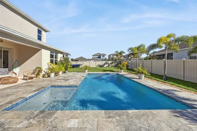 an aerial view of a house with a garden