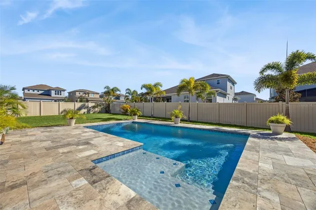 an aerial view of a house with a garden