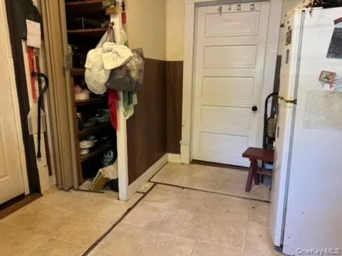 a view of a livingroom and a bathroom