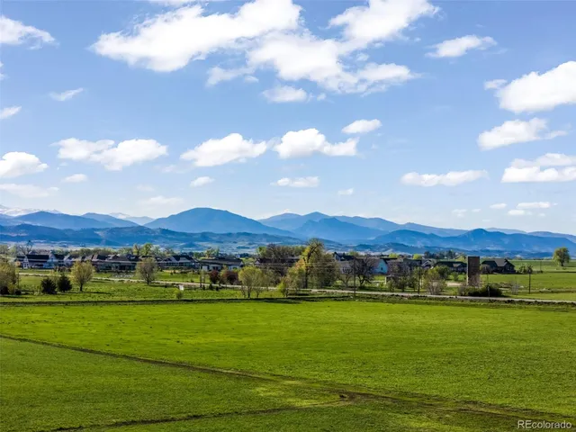 a view of an houses with outdoor view and green space