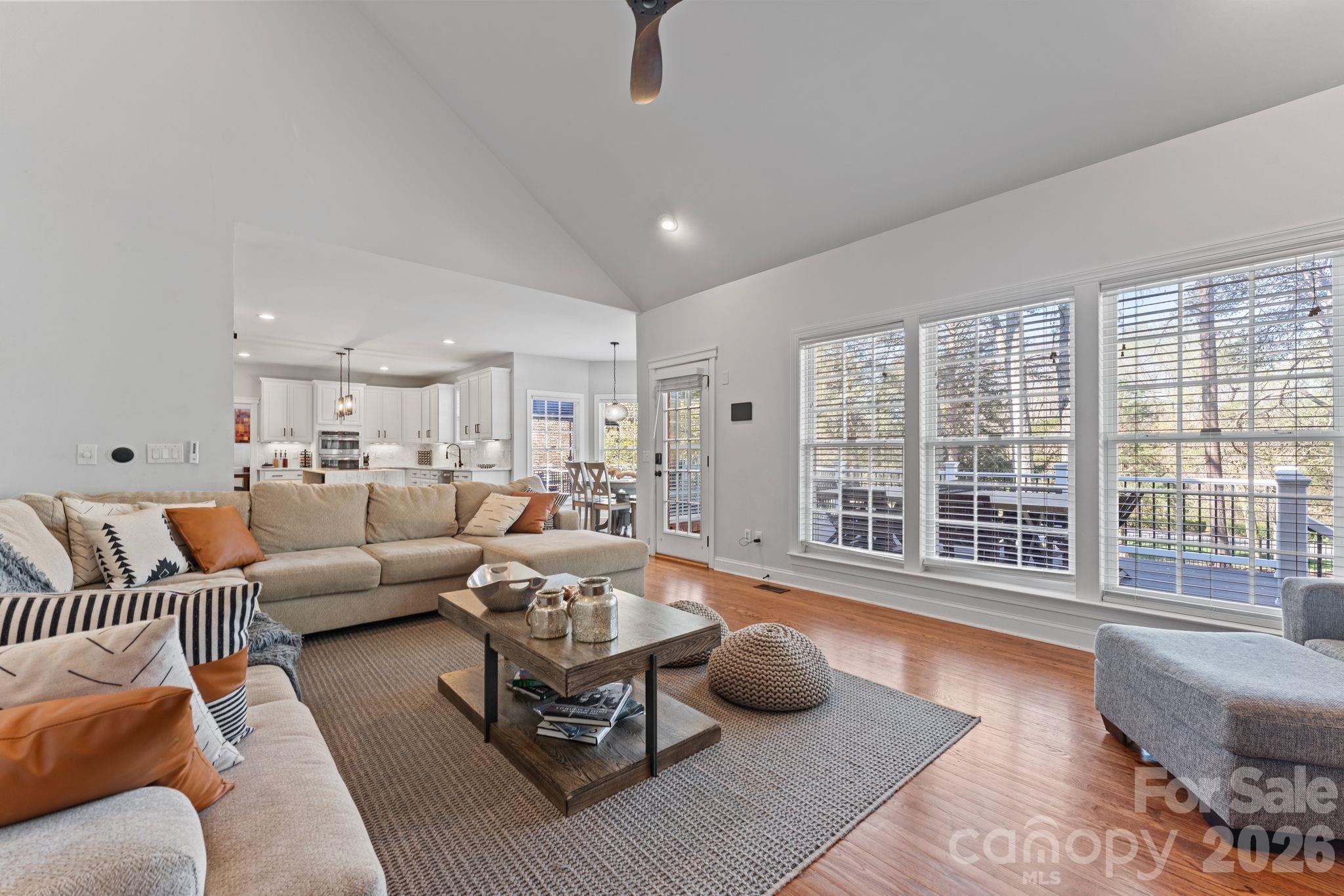 9618 Cockerham Lane Huntersville, NC 28078 - Photo 13 of 37 a living room with furniture and a large window