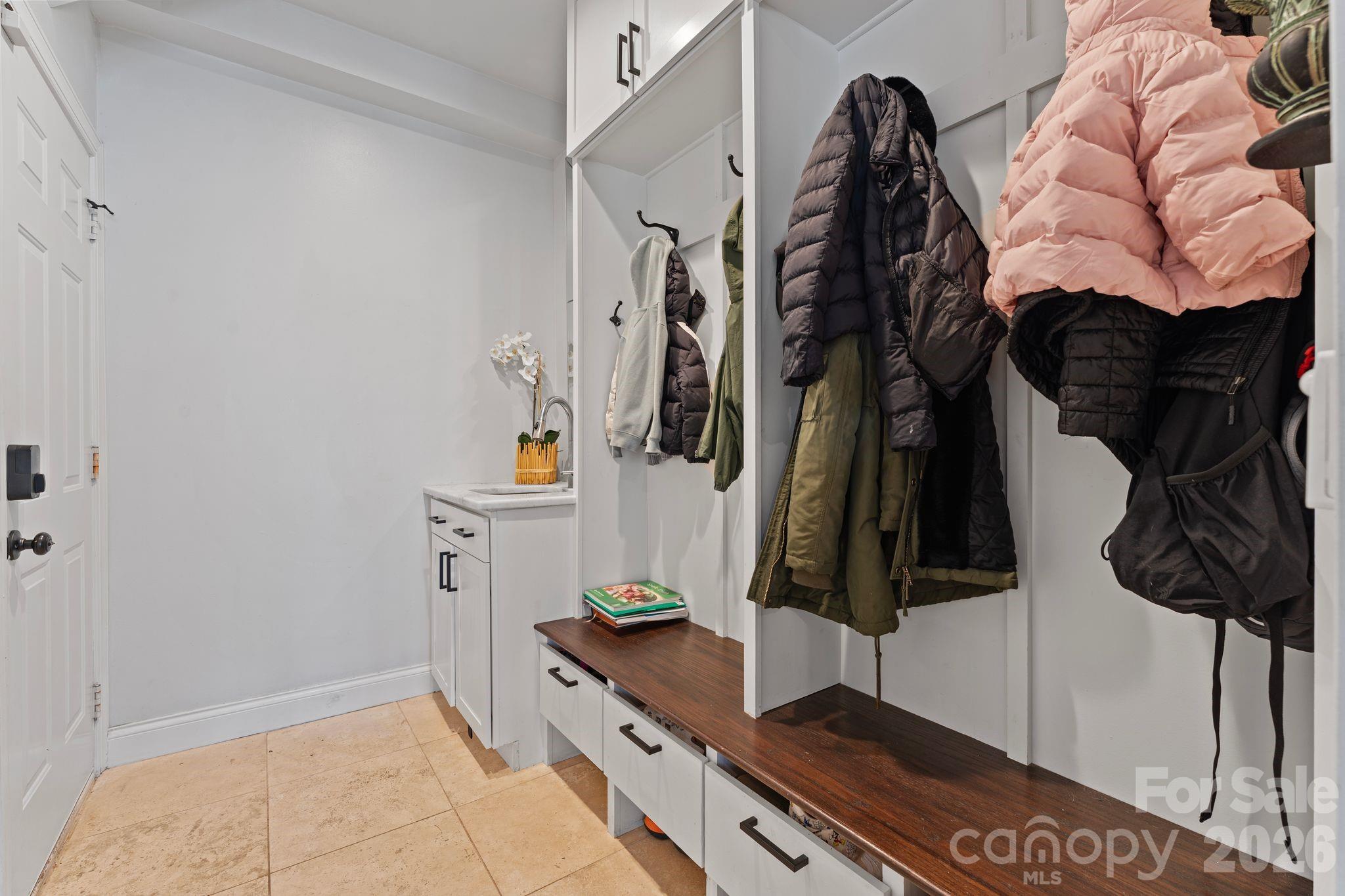 9618 Cockerham Lane Huntersville, NC 28078 - Photo 15 of 37 a view of walk in closet with clothes and shoes