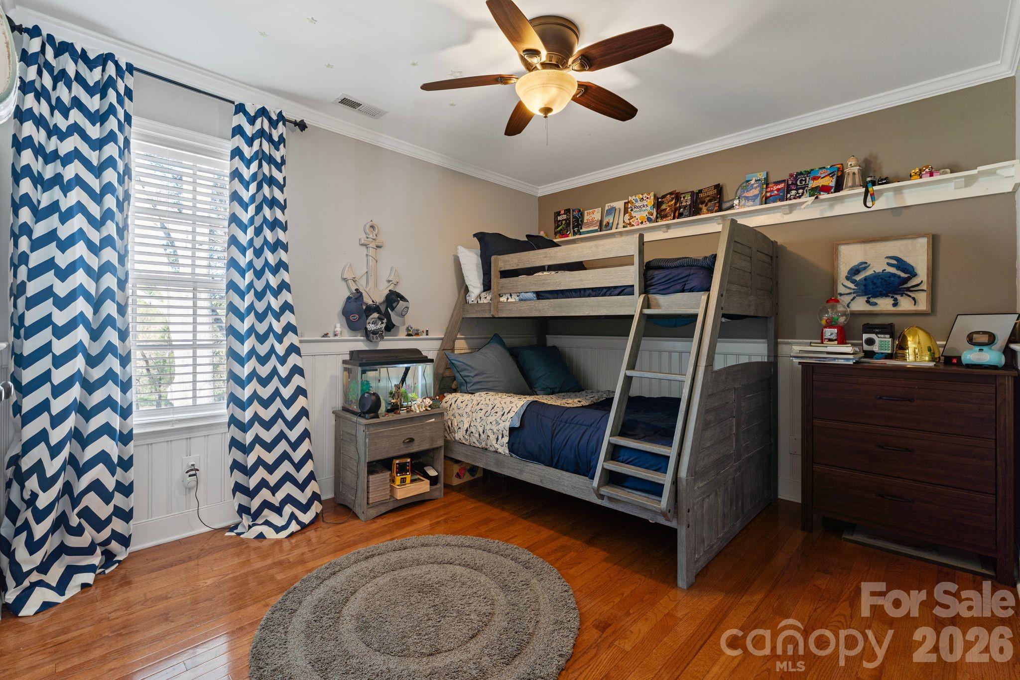 9618 Cockerham Lane Huntersville, NC 28078 - Photo 22 of 37 a bedroom with bed and a chandelier