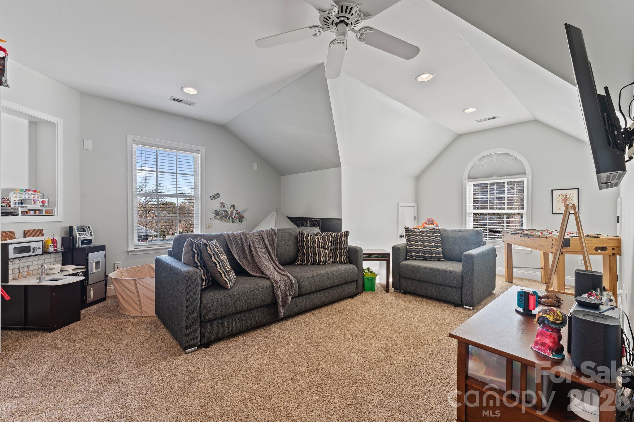 9618 Cockerham Lane Huntersville, NC 28078 - Photo 25 of 37 a living room with furniture and a window