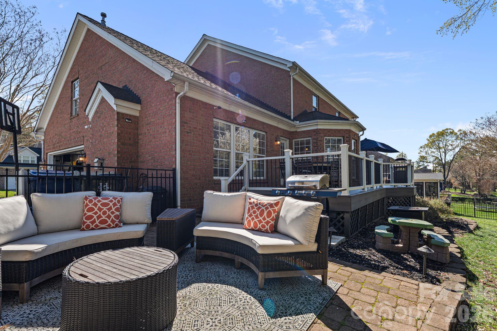 9618 Cockerham Lane Huntersville, NC 28078 - Photo 30 of 37 a roof deck with couches and potted plants
