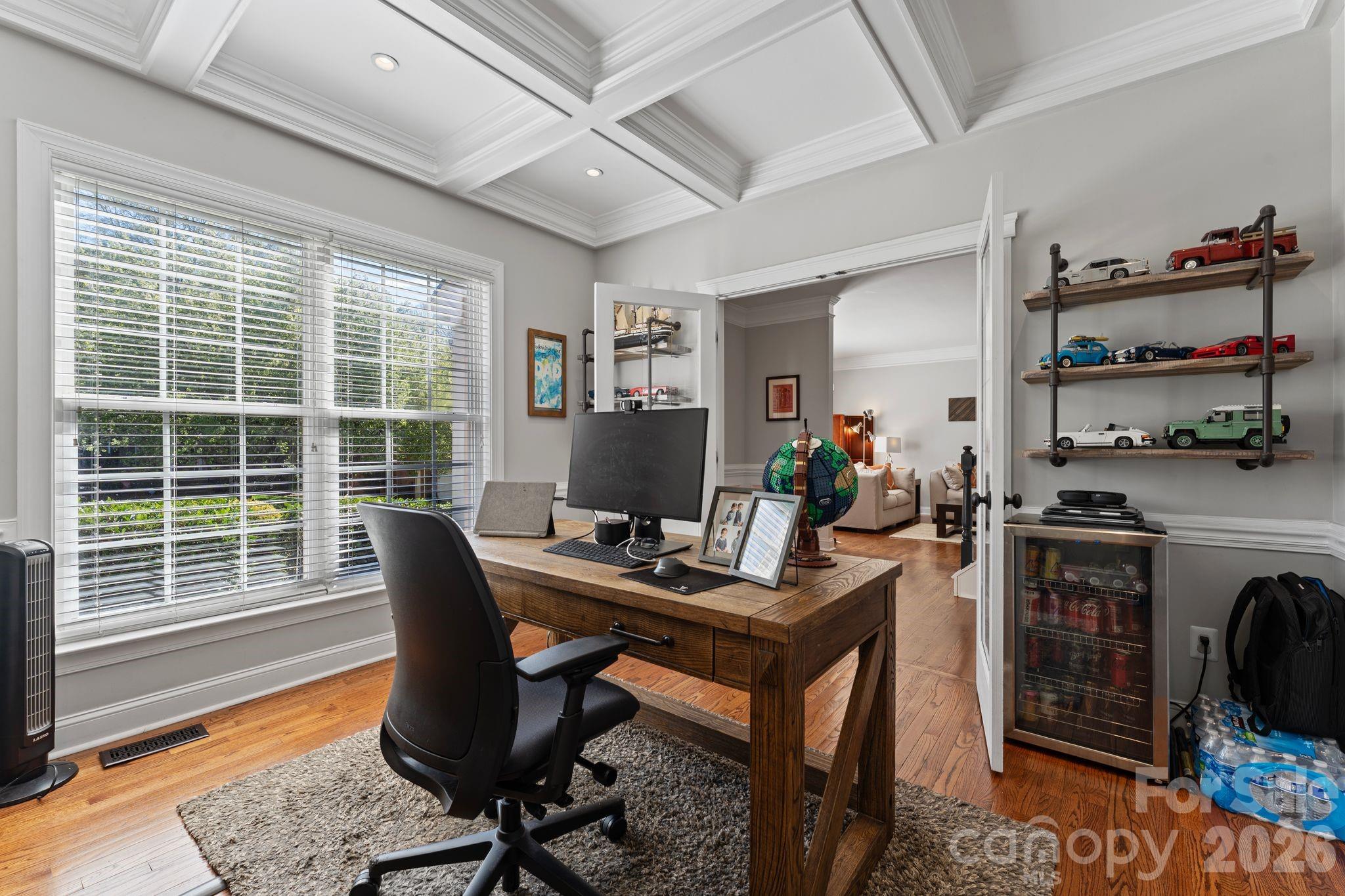 9618 Cockerham Lane Huntersville, NC 28078 - Photo 4 of 37 a view of a workspace with furniture and a window