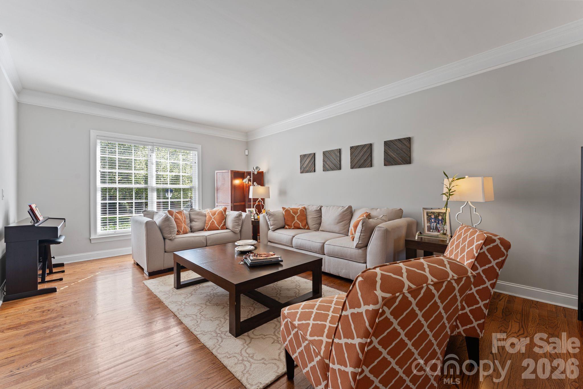 9618 Cockerham Lane Huntersville, NC 28078 - Photo 6 of 37 a living room with furniture and a table