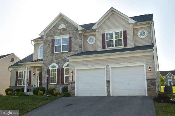 11012 Old York Road Bowie, MD 20721 - Photo 1 of 30 a front view of a house with garden