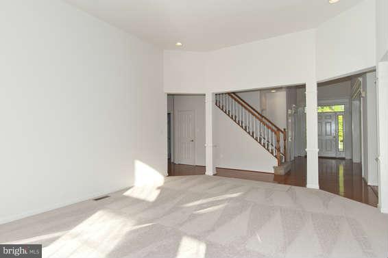 11012 Old York Road Bowie, MD 20721 - Photo 13 of 30 a view of an empty room with stairs