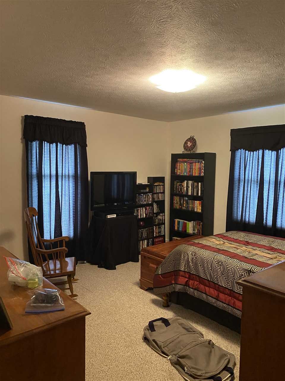 2210 Kerns Road Dayton, VA 22821 - Photo 8 of 12 a bedroom with a bed and furniture