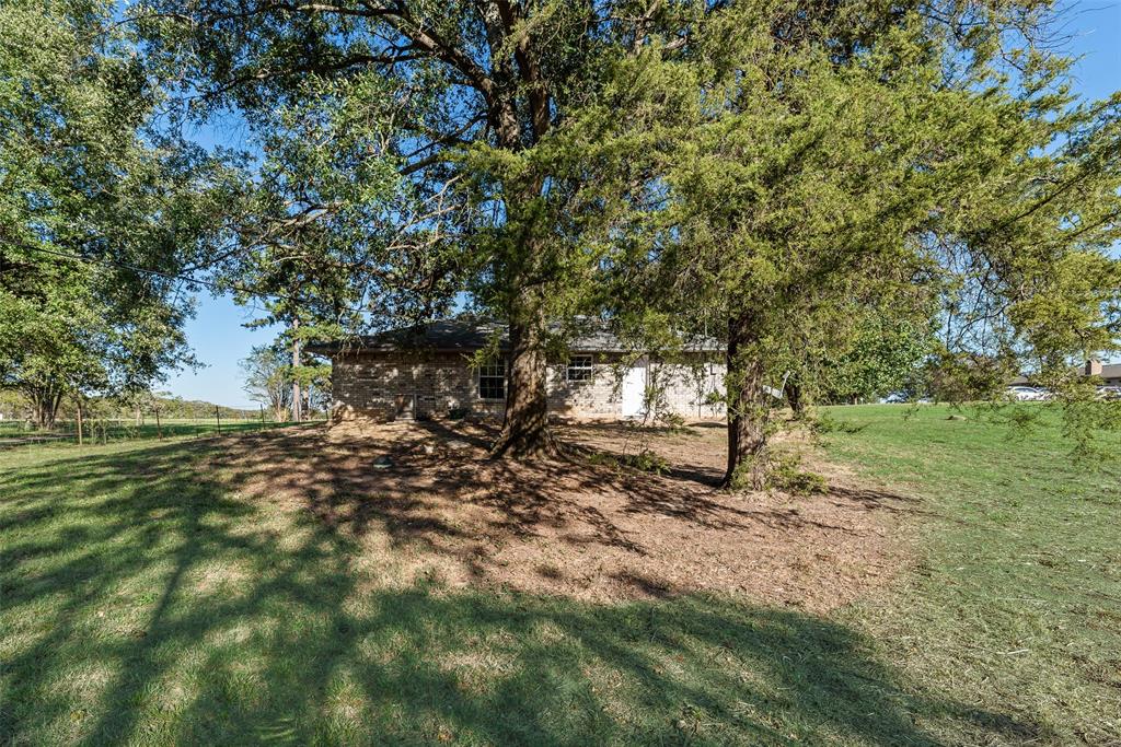 751 County Road 1240 Mount Pleasant, TX 75455 - Photo 35 of 35 a view of a tree in a yard