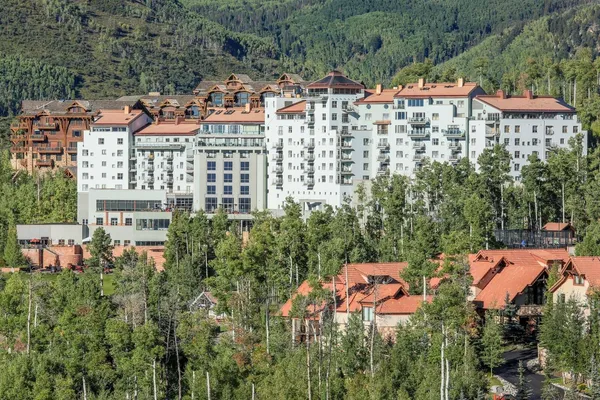 a view of an aerial view of residential houses with outdoor space and river