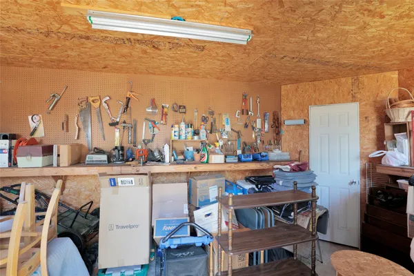 a view of a workspace with furniture