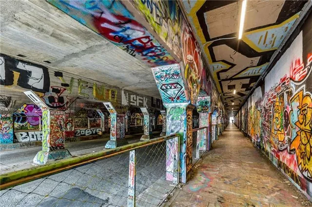 a view of backyard with plants and outdoor seating