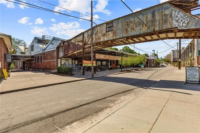 a swimming pool with outdoor seating and yard