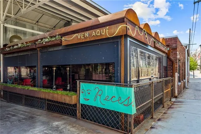 a view of swimming pool with a patio