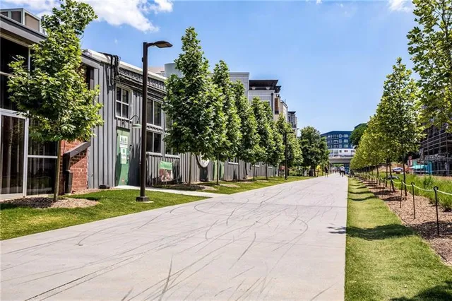 a view of a food mall next to a road