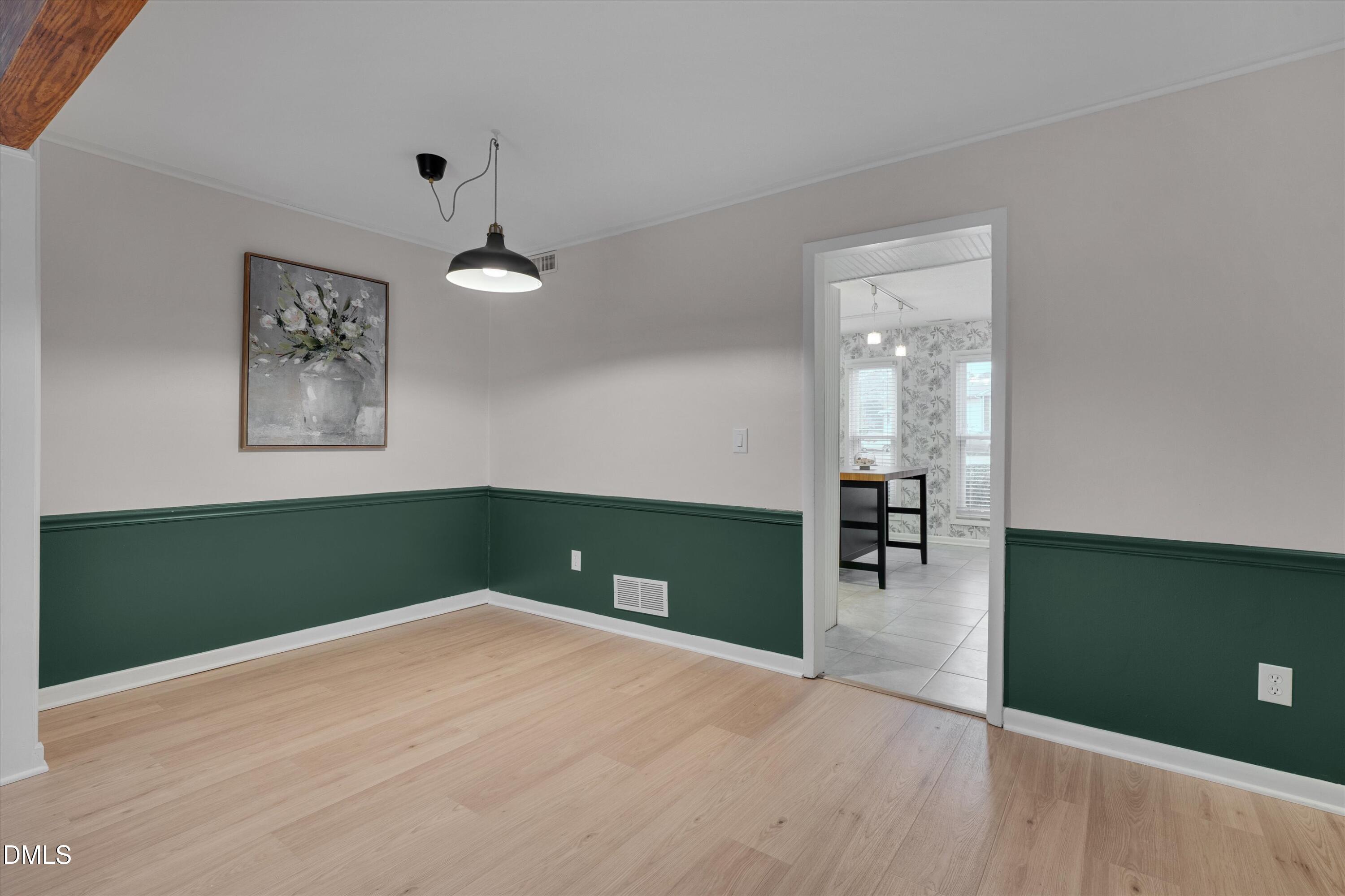 1304 Seaton Road, Unit 2 Durham, NC 27713 - Photo 6 of 19 a view of a room with a fan and a window
