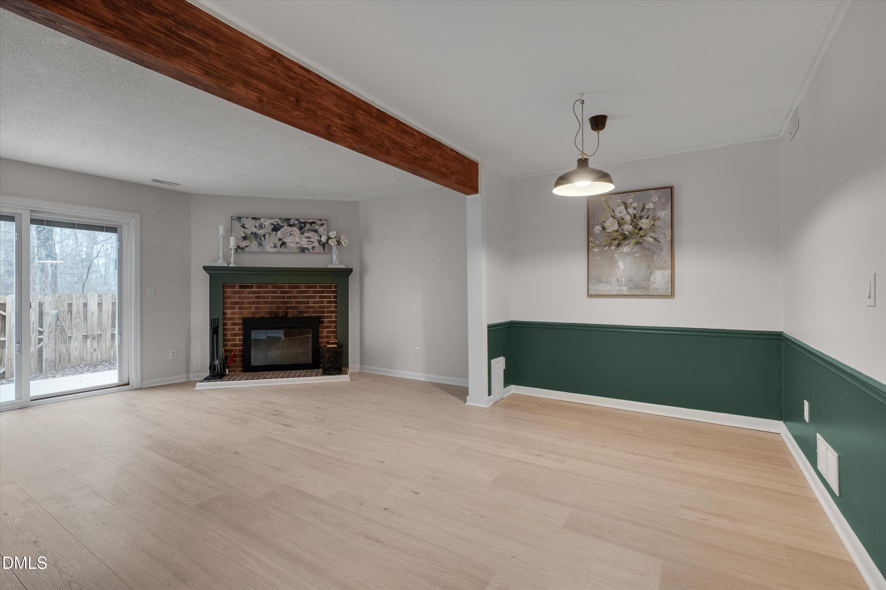 1304 Seaton Road, Unit 2 Durham, NC 27713 - Photo 7 of 19 a view of empty room with a fireplace