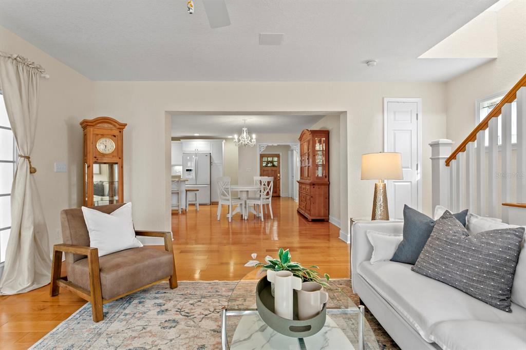 309 Park Ridge Avenue Temple Terrace, FL 33617 - Photo 16 of 60 a living room with furniture and wooden floor
