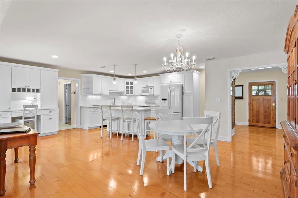 309 Park Ridge Avenue Temple Terrace, FL 33617 - Photo 17 of 60 a dining room with furniture and chandelier
