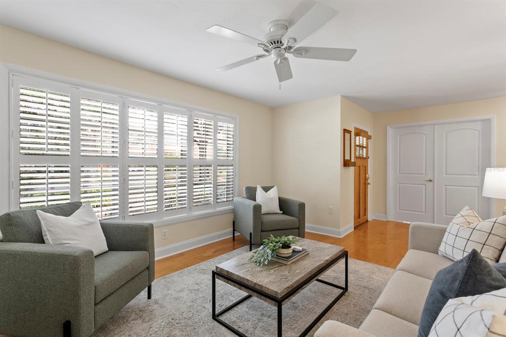 309 Park Ridge Avenue Temple Terrace, FL 33617 - Photo 22 of 60 a living room with furniture and a large window