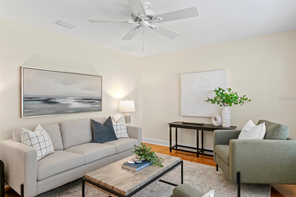 309 Park Ridge Avenue Temple Terrace, FL 33617 - Photo 24 of 60 a living room with furniture and a potted plant