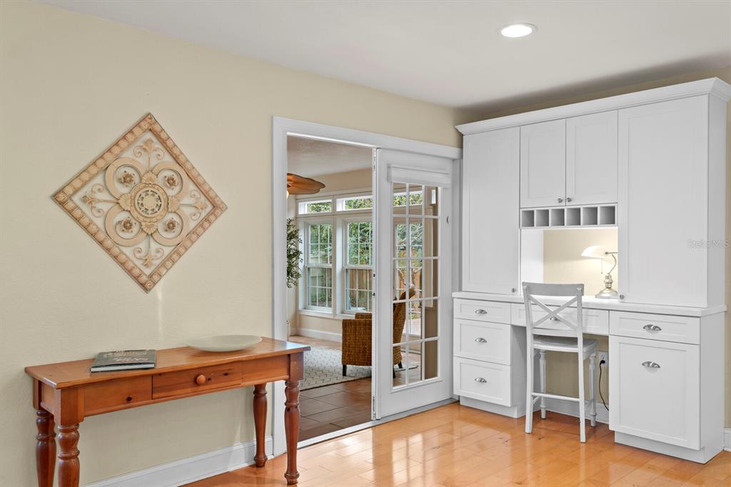 309 Park Ridge Avenue Temple Terrace, FL 33617 - Photo 25 of 60 a view of a room with wooden floor and cabinet