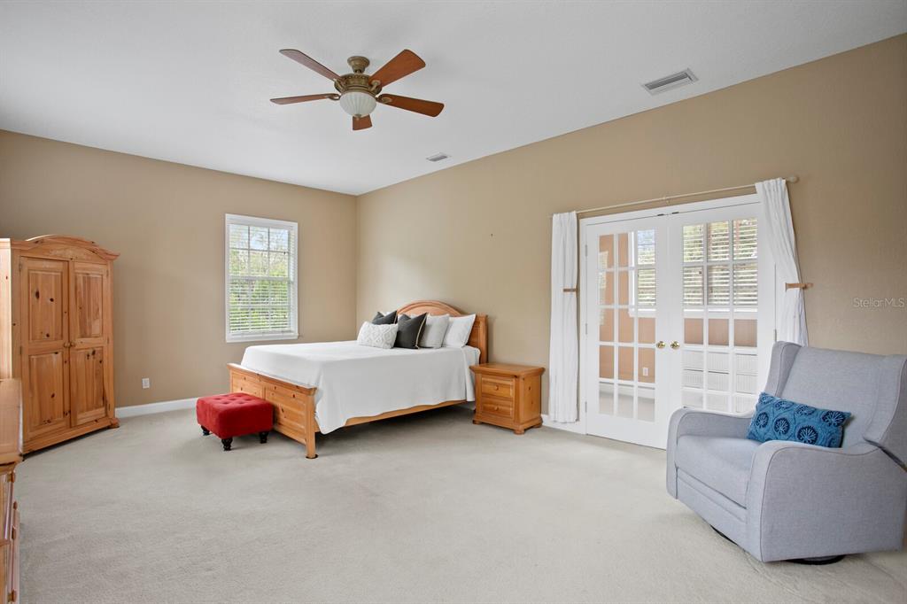 309 Park Ridge Avenue Temple Terrace, FL 33617 - Photo 27 of 60 a bed room with a bed and a couch