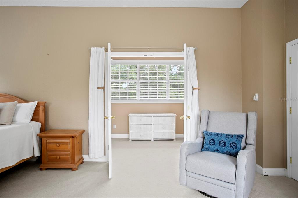 309 Park Ridge Avenue Temple Terrace, FL 33617 - Photo 30 of 60 a living room with furniture and a window