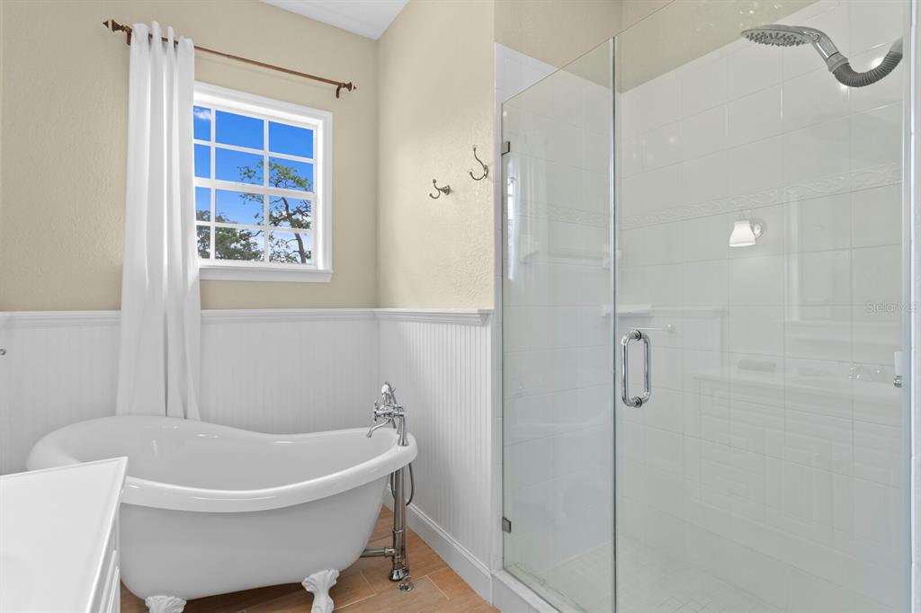 309 Park Ridge Avenue Temple Terrace, FL 33617 - Photo 33 of 60 a bathroom with a bathtub and shower