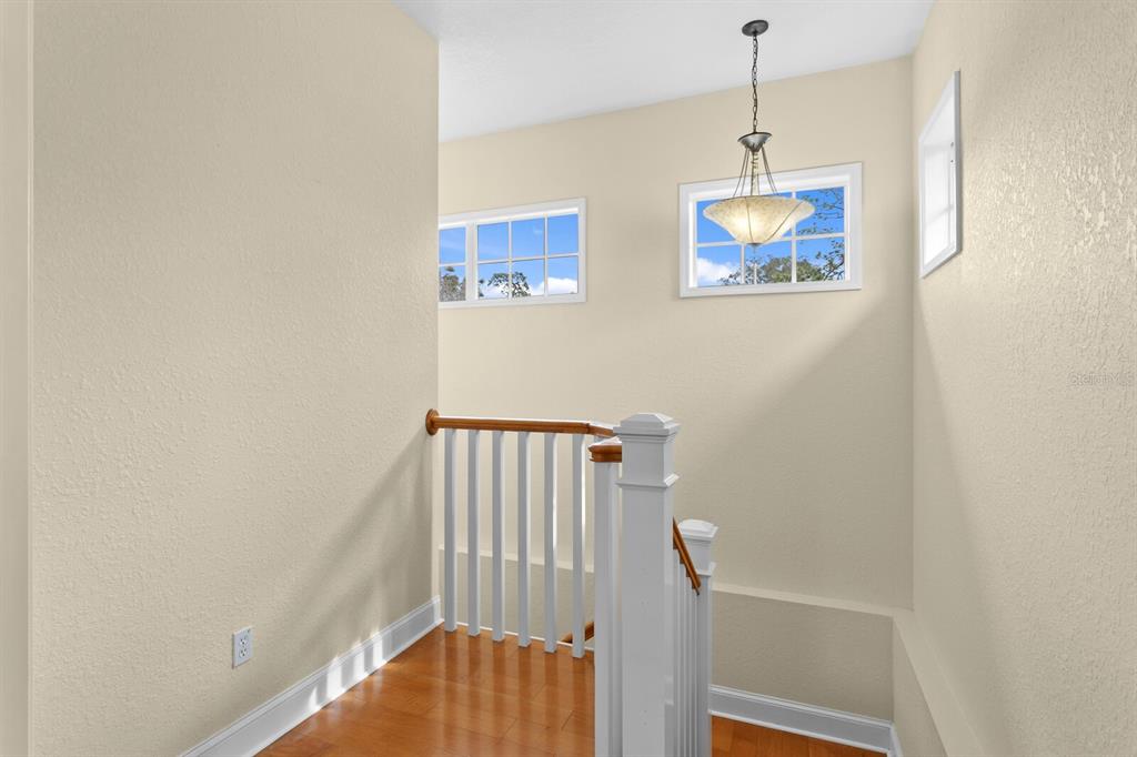 309 Park Ridge Avenue Temple Terrace, FL 33617 - Photo 35 of 60 a view of entryway with stairs and wooden floor
