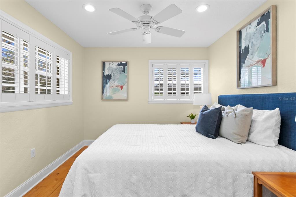 309 Park Ridge Avenue Temple Terrace, FL 33617 - Photo 37 of 60 a bedroom with a large bed and a window