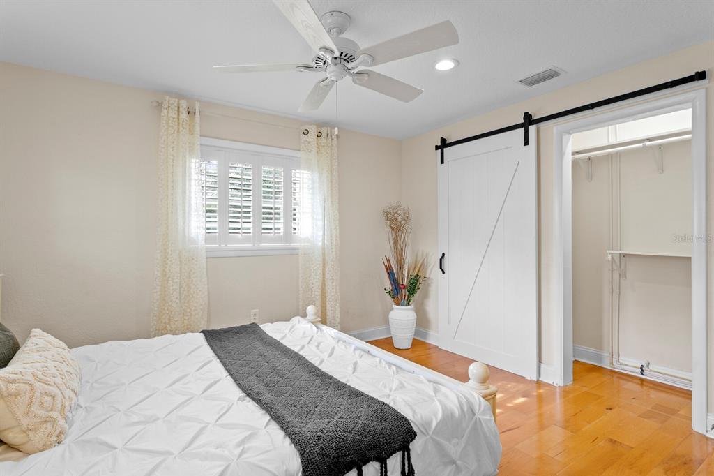 309 Park Ridge Avenue Temple Terrace, FL 33617 - Photo 46 of 60 a bedroom with a bed and a window