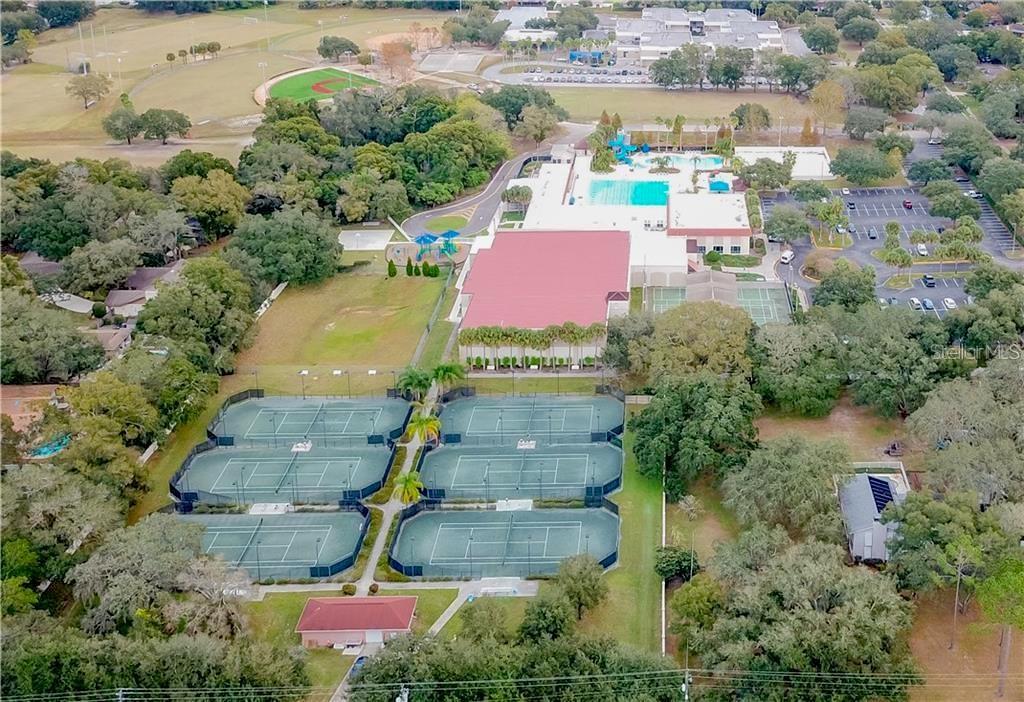309 Park Ridge Avenue Temple Terrace, FL 33617 - Photo 59 of 60 an aerial view of residential houses with outdoor space and lake view