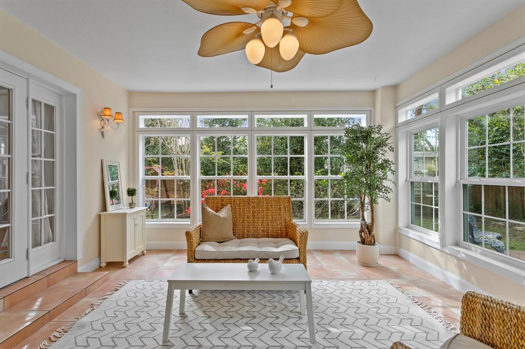 309 Park Ridge Avenue Temple Terrace, FL 33617 - Photo 8 of 60 a living room with furniture and a large window