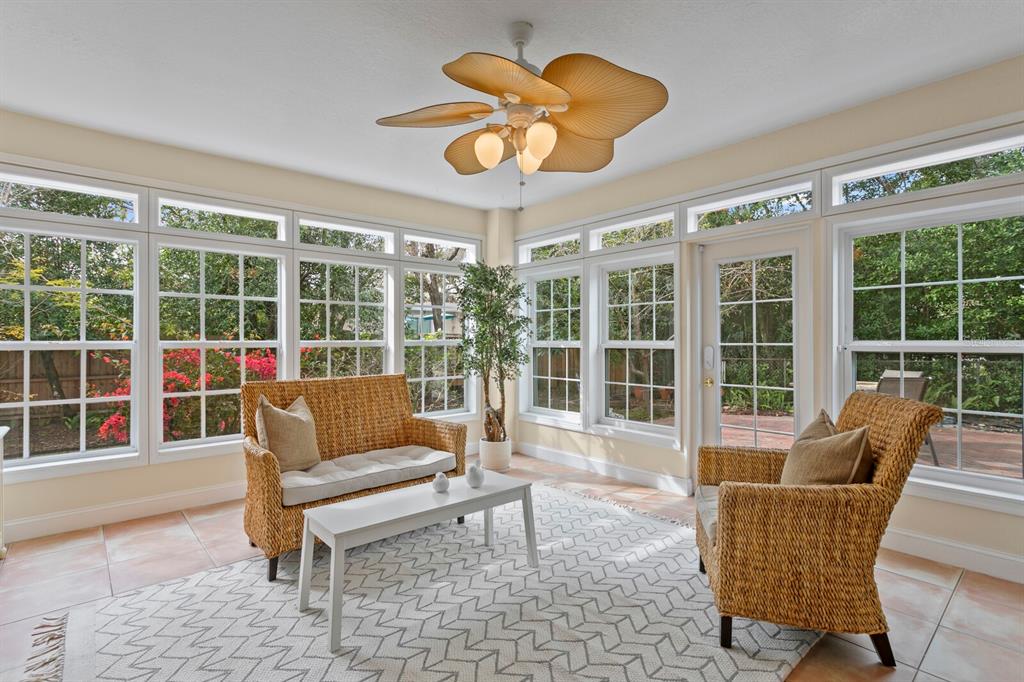 309 Park Ridge Avenue Temple Terrace, FL 33617 - Photo 9 of 60 a living room with furniture and a large window