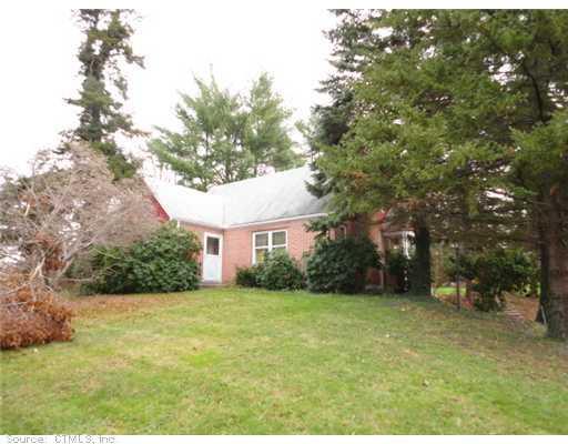 43 2 Mile Road Farmington, CT 06032 - Photo 1 of 1 a view of a backyard with a garden